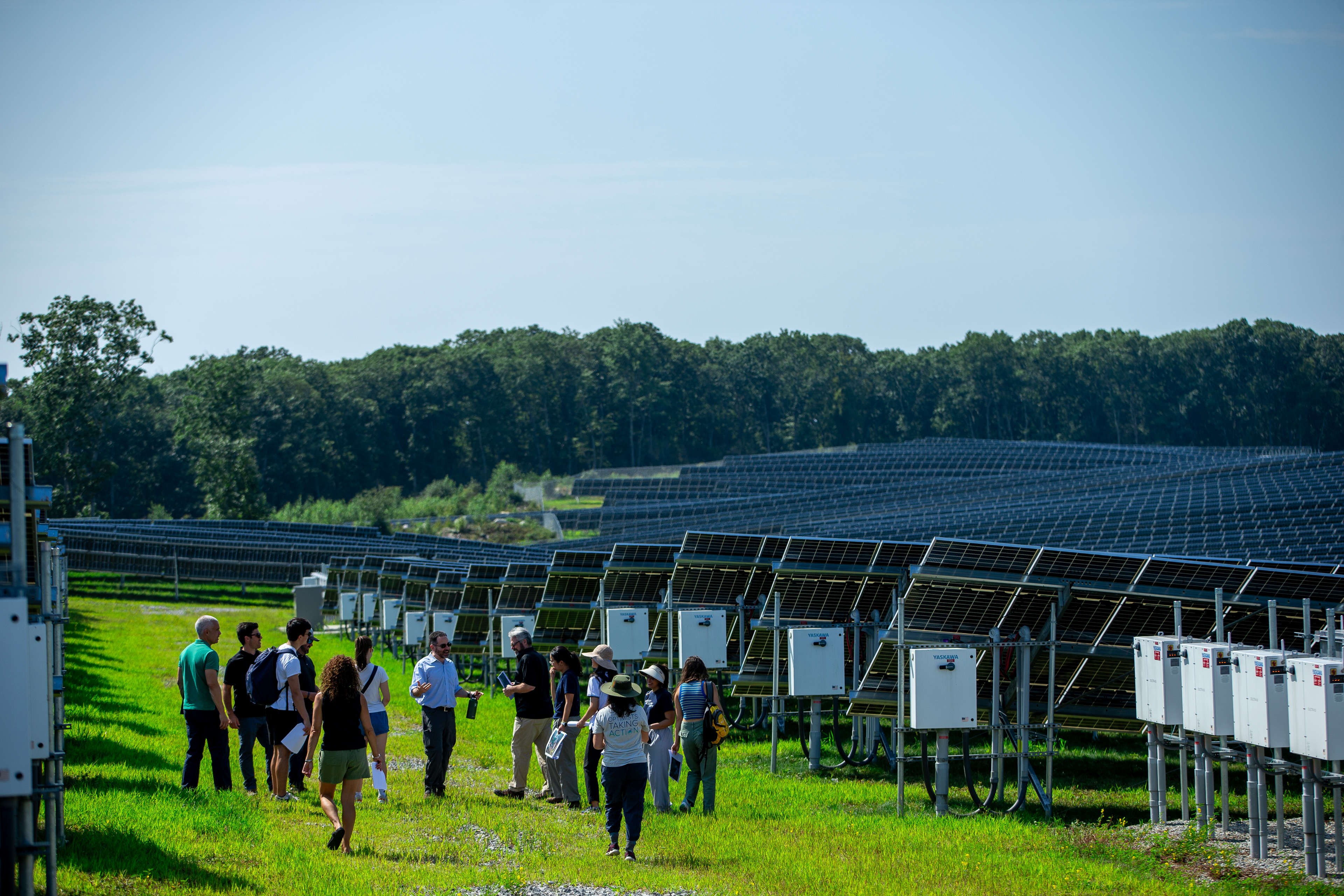Photo of a class of students visiting a solar farm
