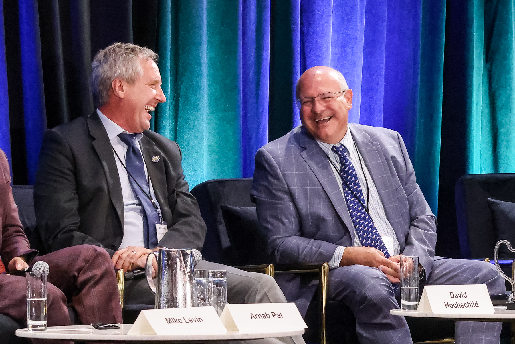 CEC Chair David Hochschild and LADWP GM Martin Adams laughing on plenary stage